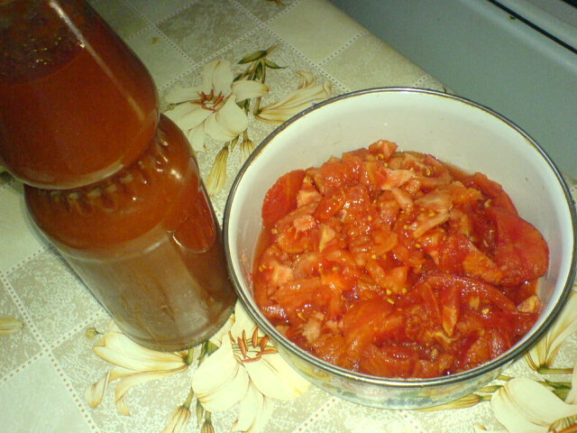 Bean stew in a cauldron with smoked meats