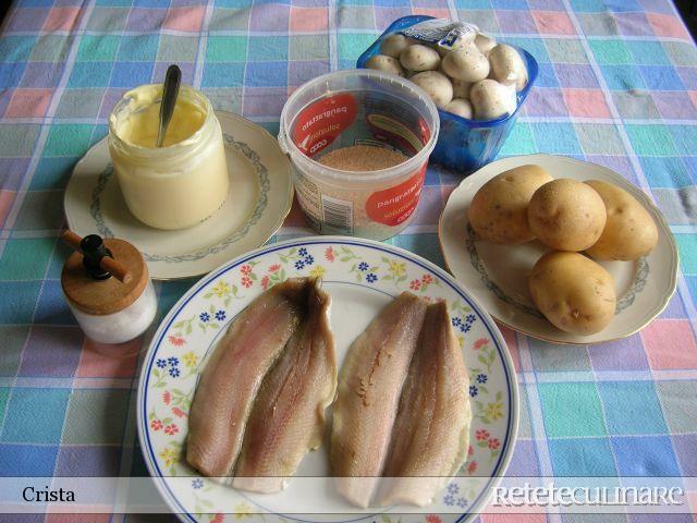 Baked herring fillets with a side of potatoes